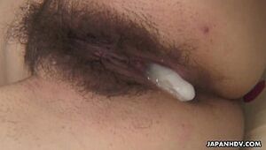 Filling her hairy pussy in a very rough mannor